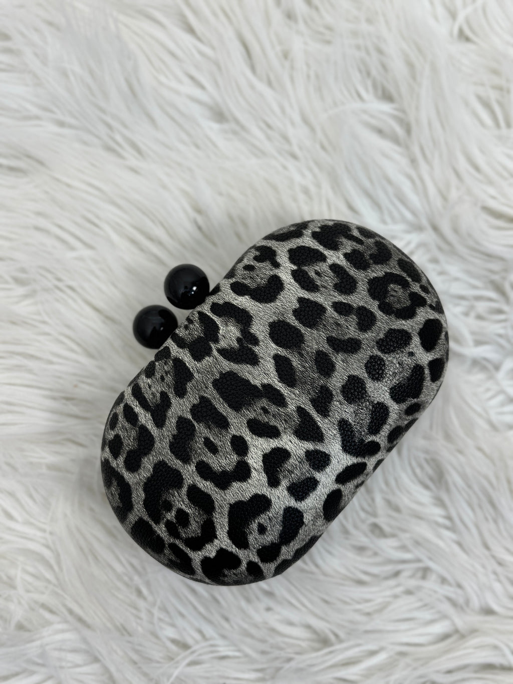 CLUTCH LEOPARDATA